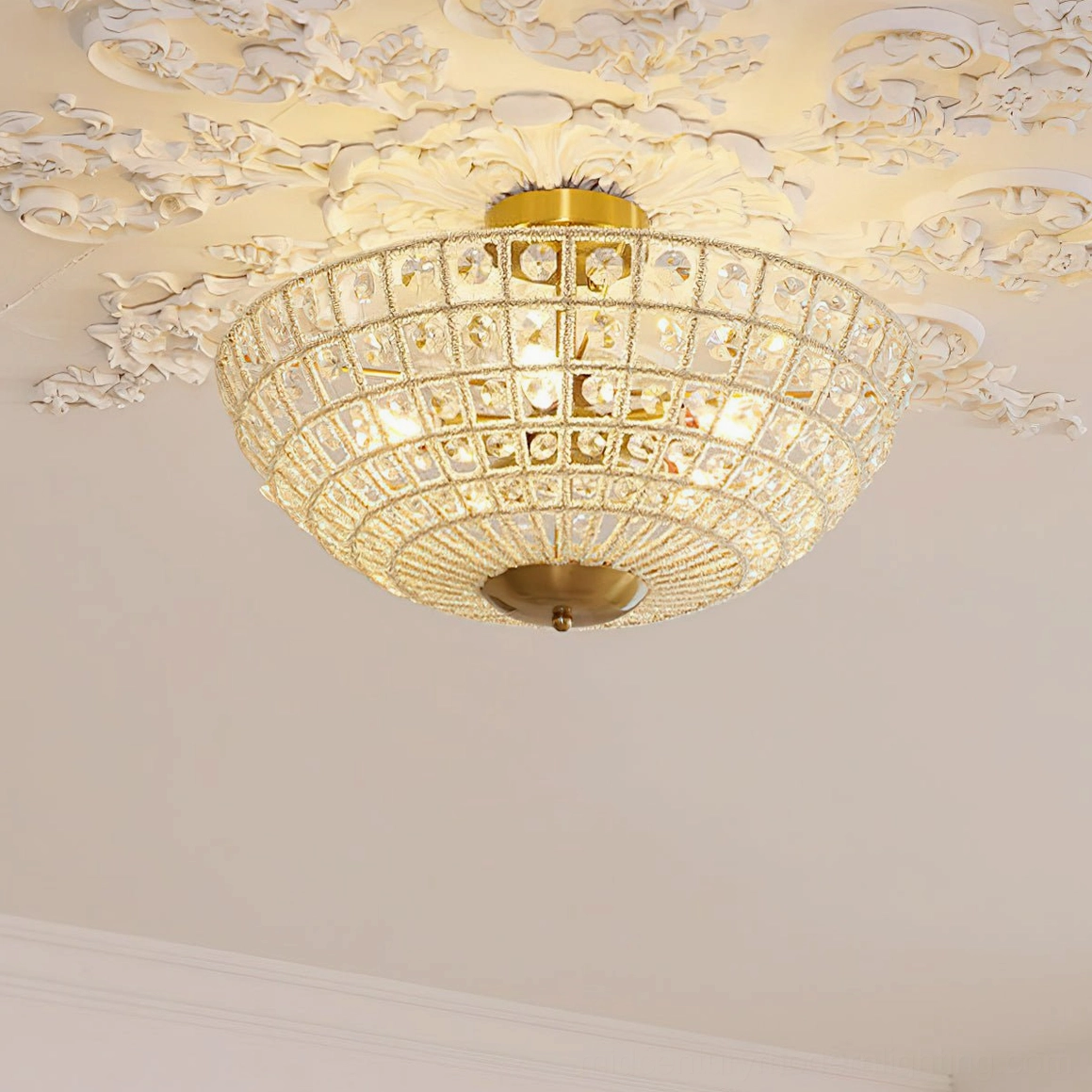 Devan crystal ceiling light illuminated from below - full crystal shade with internal lighting against ornate ceiling