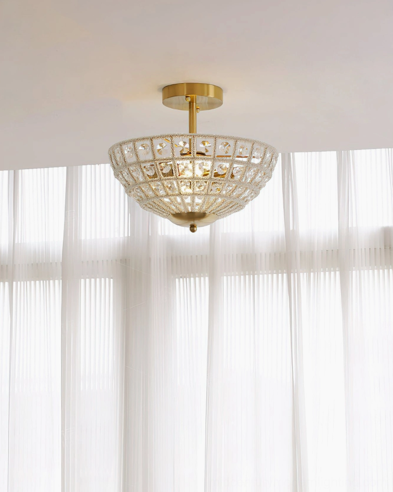 Devan crystal semi-flush ceiling light wide view - compact crystal bowl with gold fixtures and window light