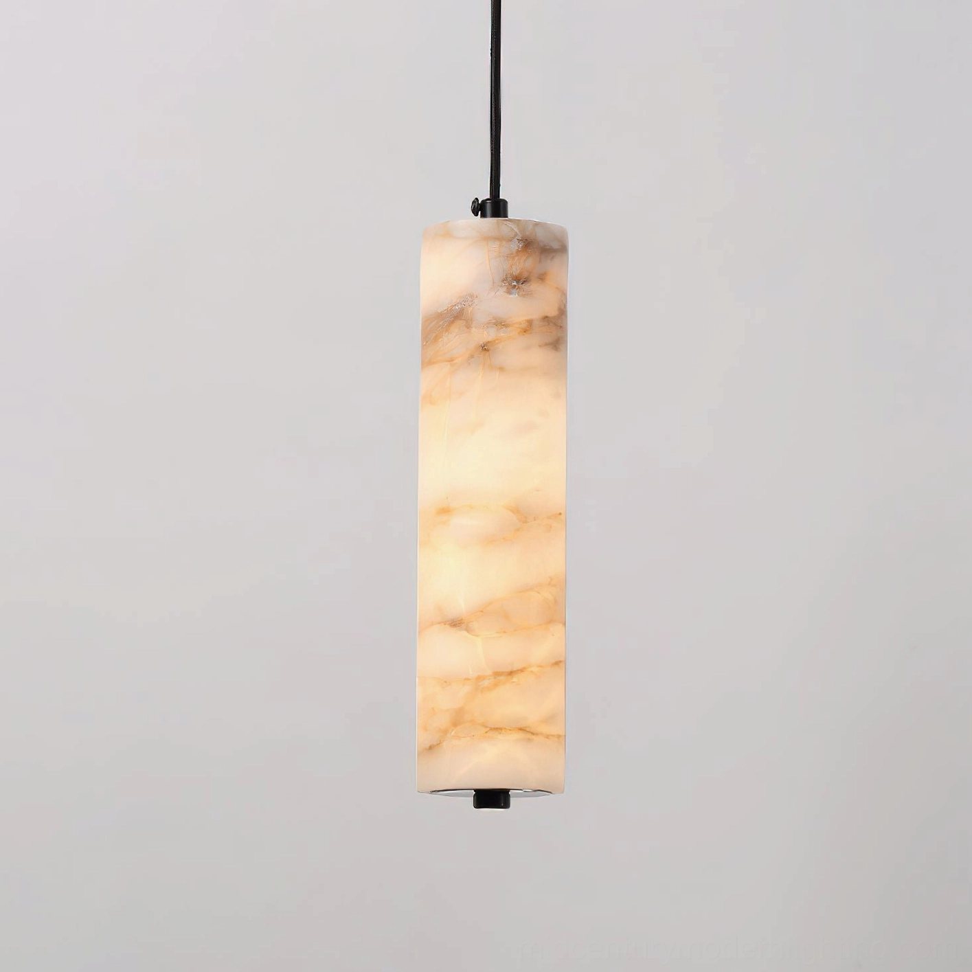 Close-up front view of Devane alabaster pendant light showing subtle brown marble veining and matte black metal canopy on grey background