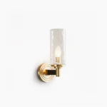 Devora brass wall sconce with rippled glass shade, front studio view showing mid-century modern design