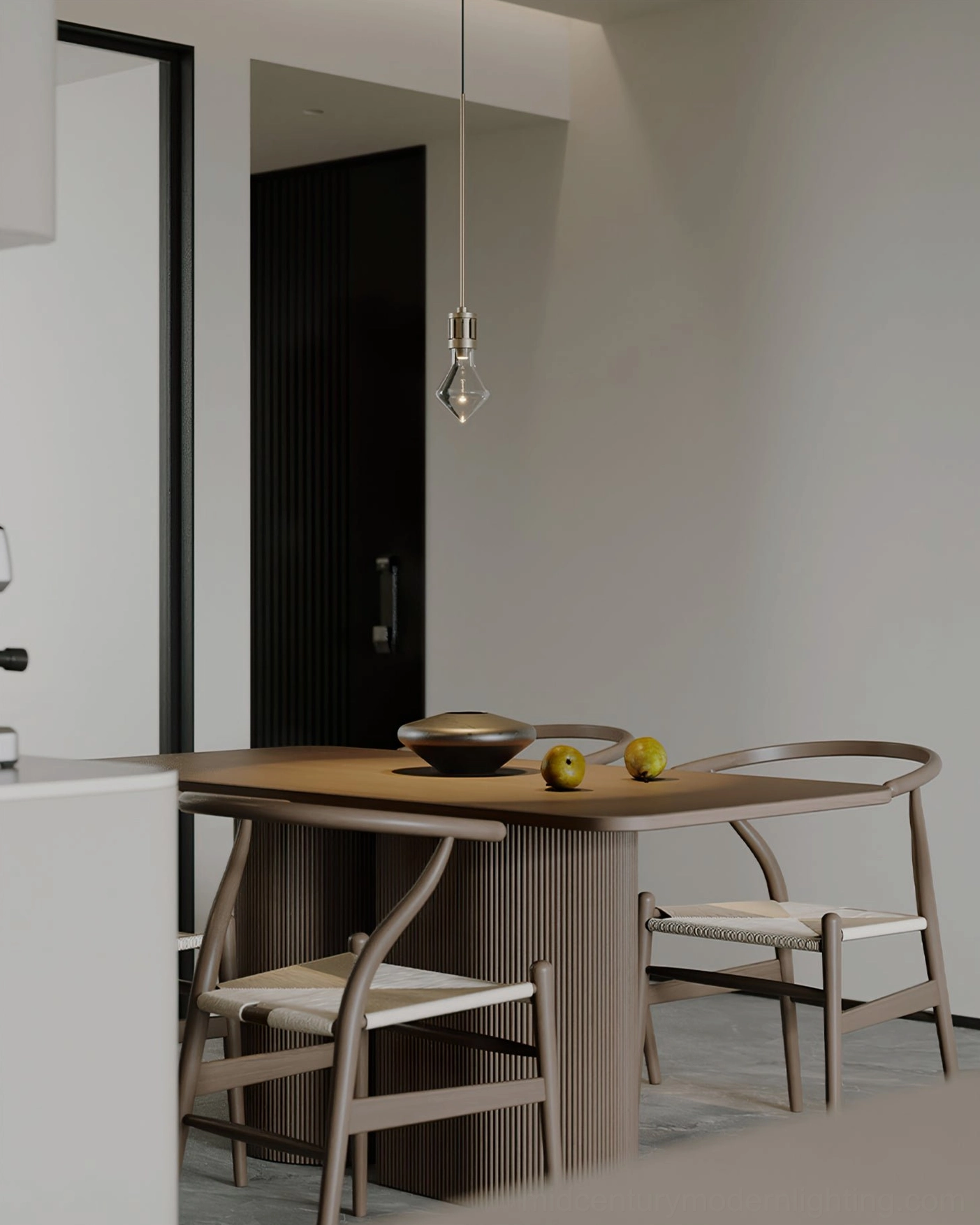 Diamond pendant light with brushed nickel hardware suspended in modern kitchen dining space showing minimalist aesthetic