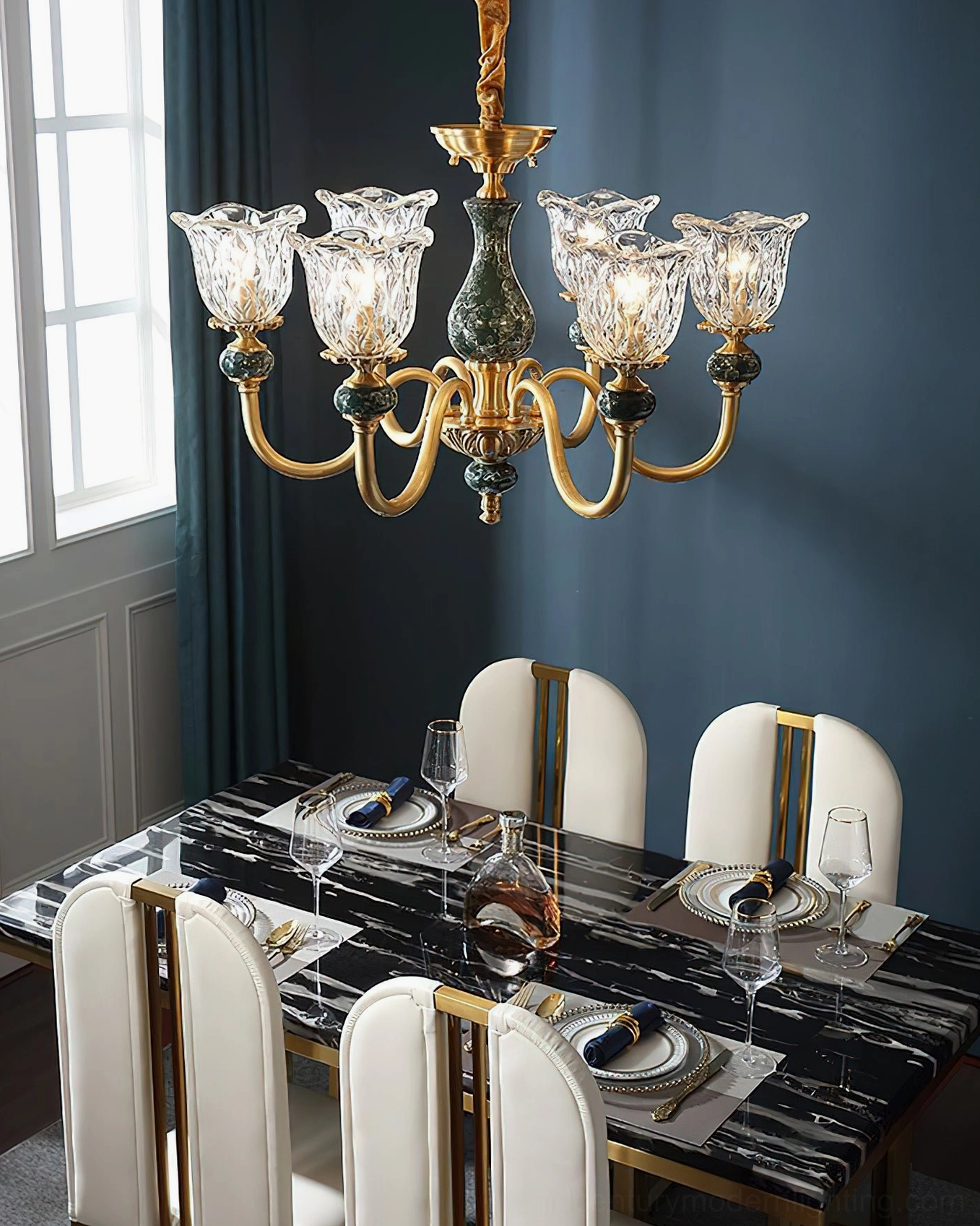Dieppe 10-light emerald brass chandelier blue wall living room with velvet sofa and gold clock