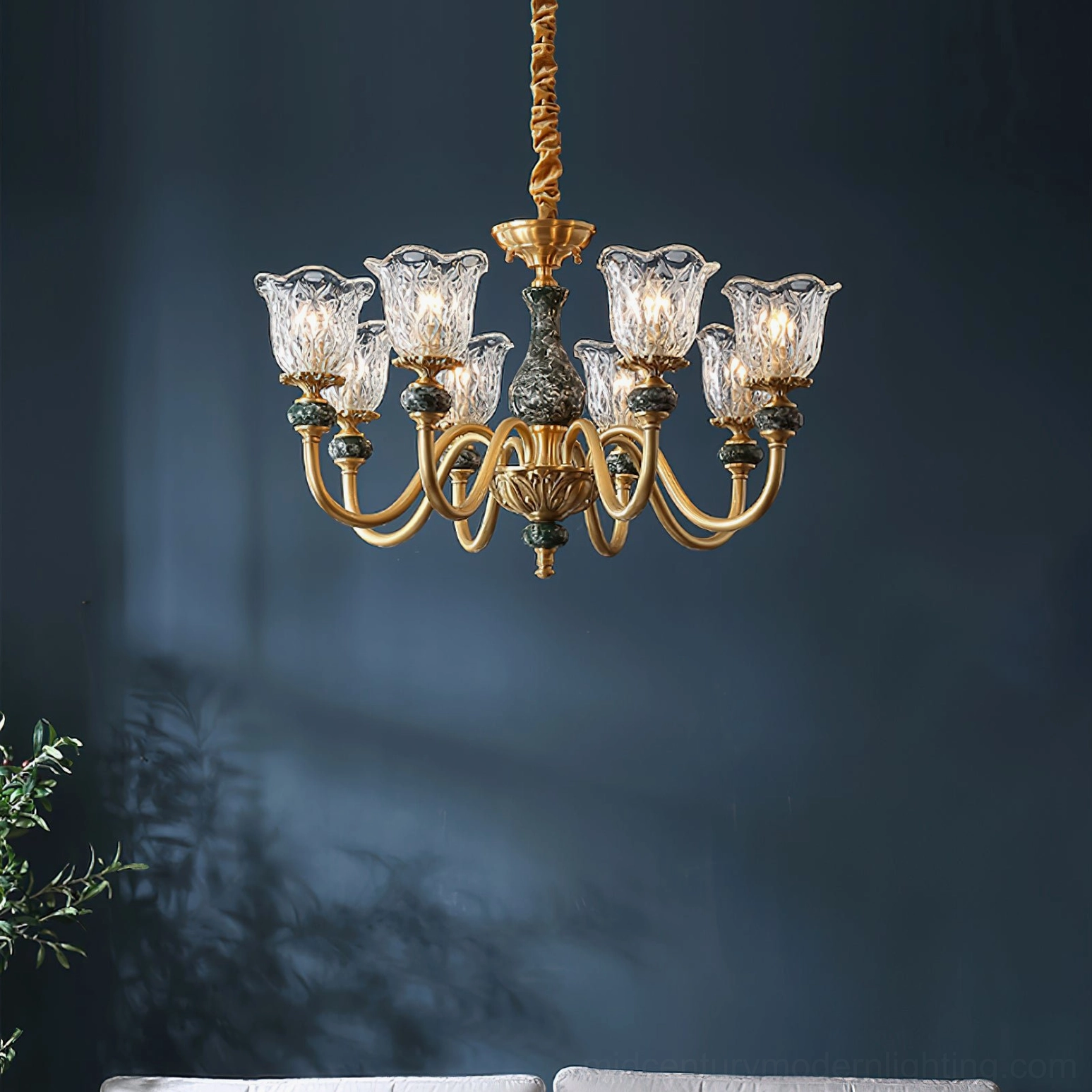 Dieppe 8-light modern chandelier in contemporary living room with blue wall and sofa