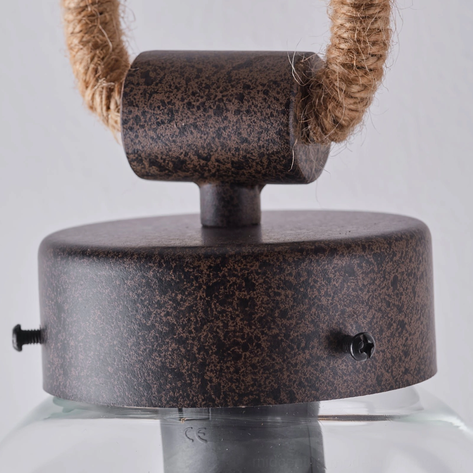Dillon lamp top joint component showing dark brown aged metal and natural hemp rope attachment detail