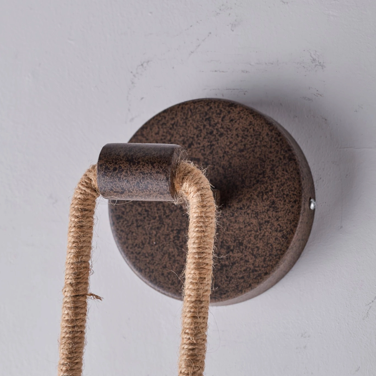 Dillon wall lamp round metal mounting base with installation screws and hardware detail