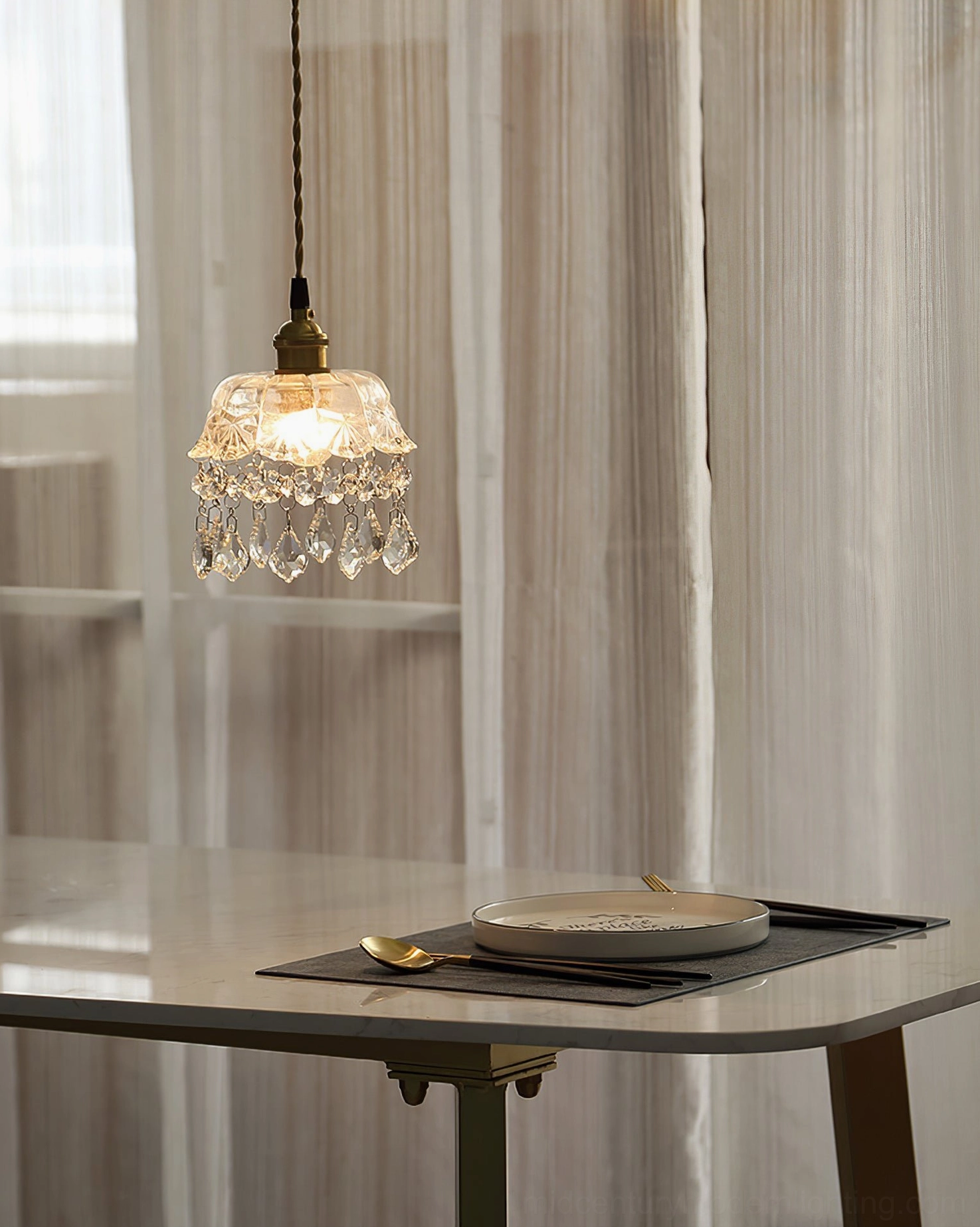 Dining room pendant light hanging above table with sheer curtains, soft elegant illumination