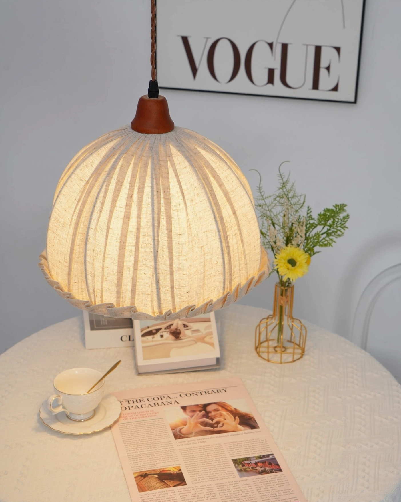 Dippa fabric pendant side profile studio shot highlighting organic seedpod silhouette