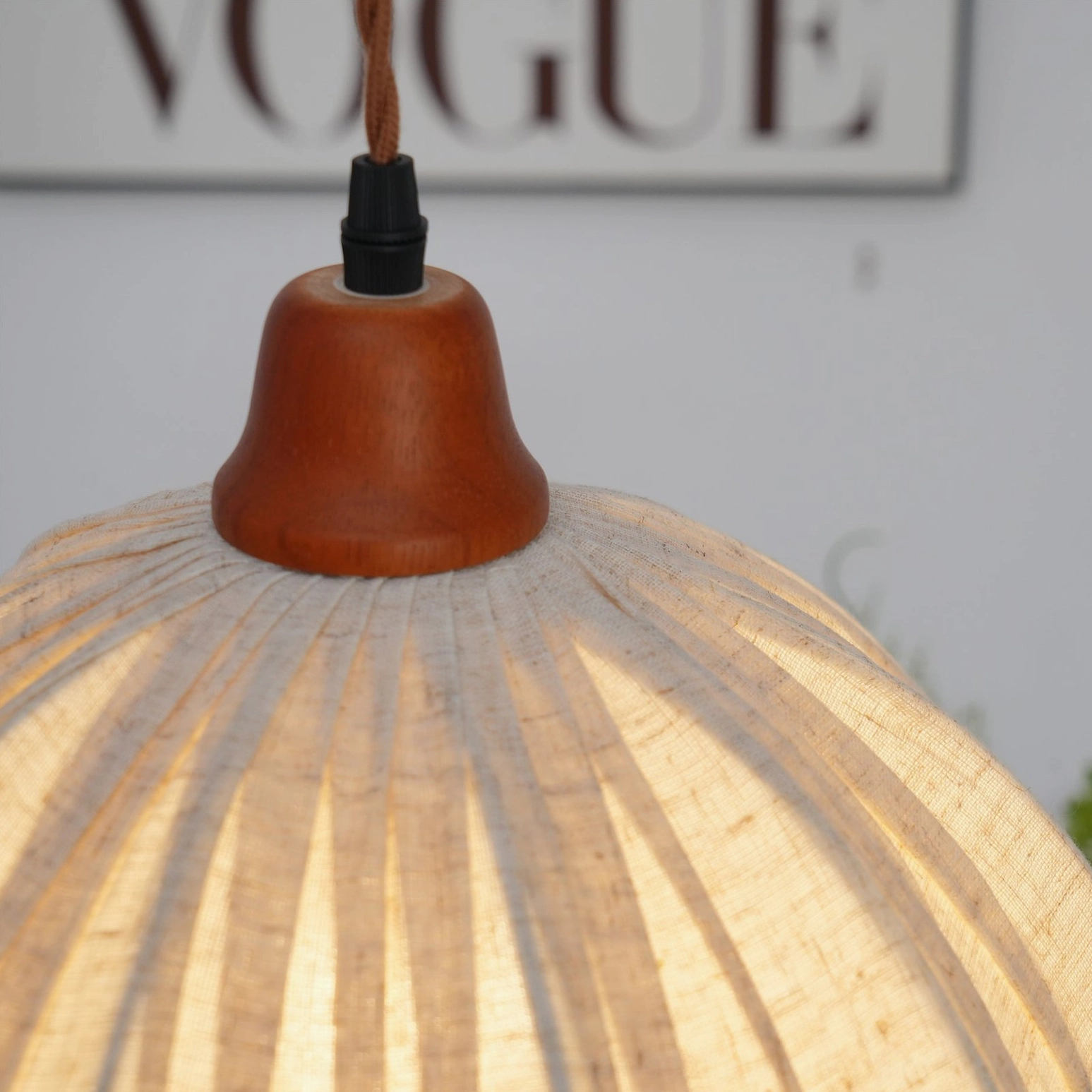 Dippa fabric pendant light studio photography with warm neutral tones and shadows