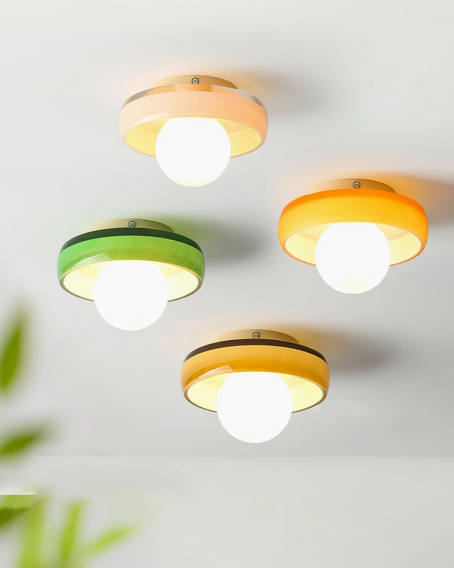 Four Disc Orb Ceiling Light color variants displayed together, white orange green and pink finishes
