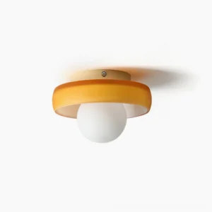 Disc Orb Ceiling Light with white frosted globe and orange metal frame, overhead close-up view on white background