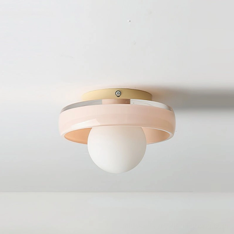 Pink frosted disc orb ceiling light with white globe, pastel finish for minimalist modern spaces