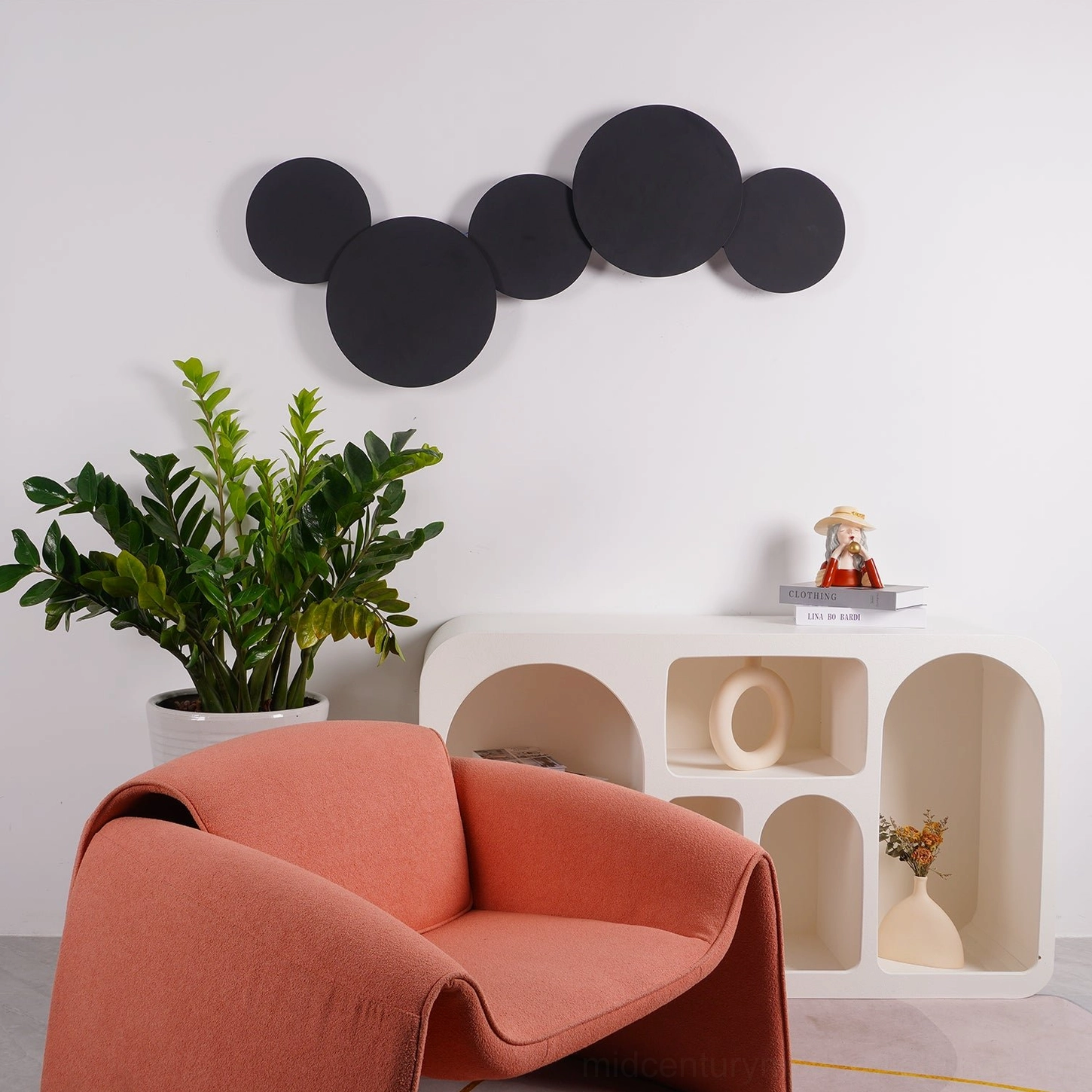Geometric disc wall sconce with integrated LED warm light technology creating soft ambient illumination without harsh glare