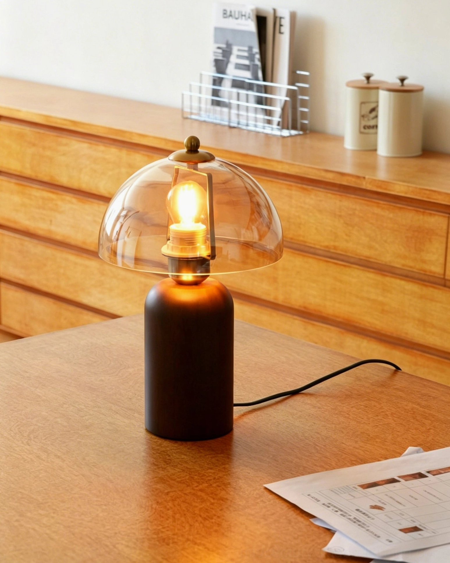 Disko table lamp detail showing brushed metal collar and walnut cylindrical base construction