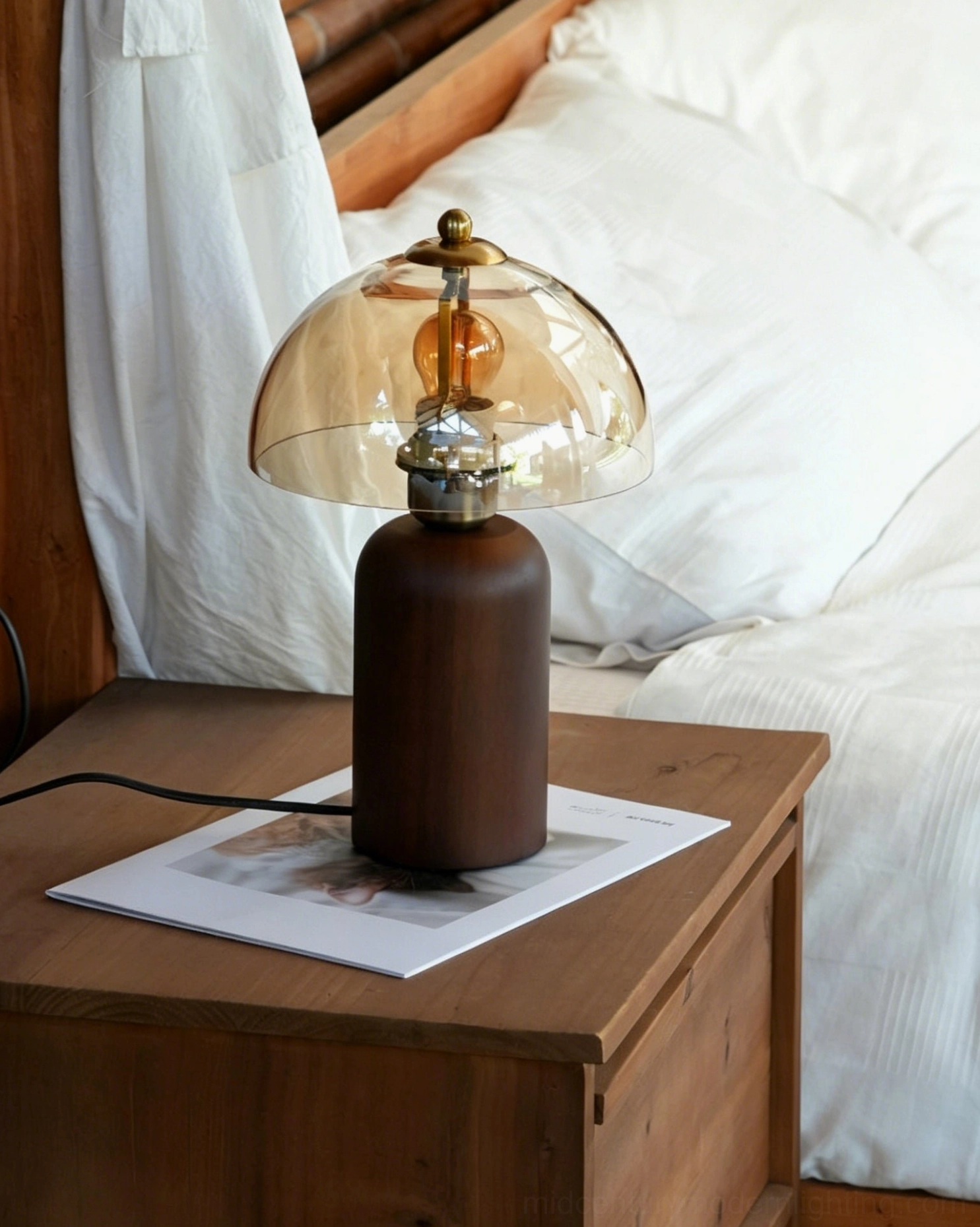 Disko mid-century modern table lamp close-up on bedroom nightstand, solid walnut base detail