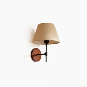 Dodie Japandi wall sconce with beige linen shade, black metal rod, and walnut wood base on white background