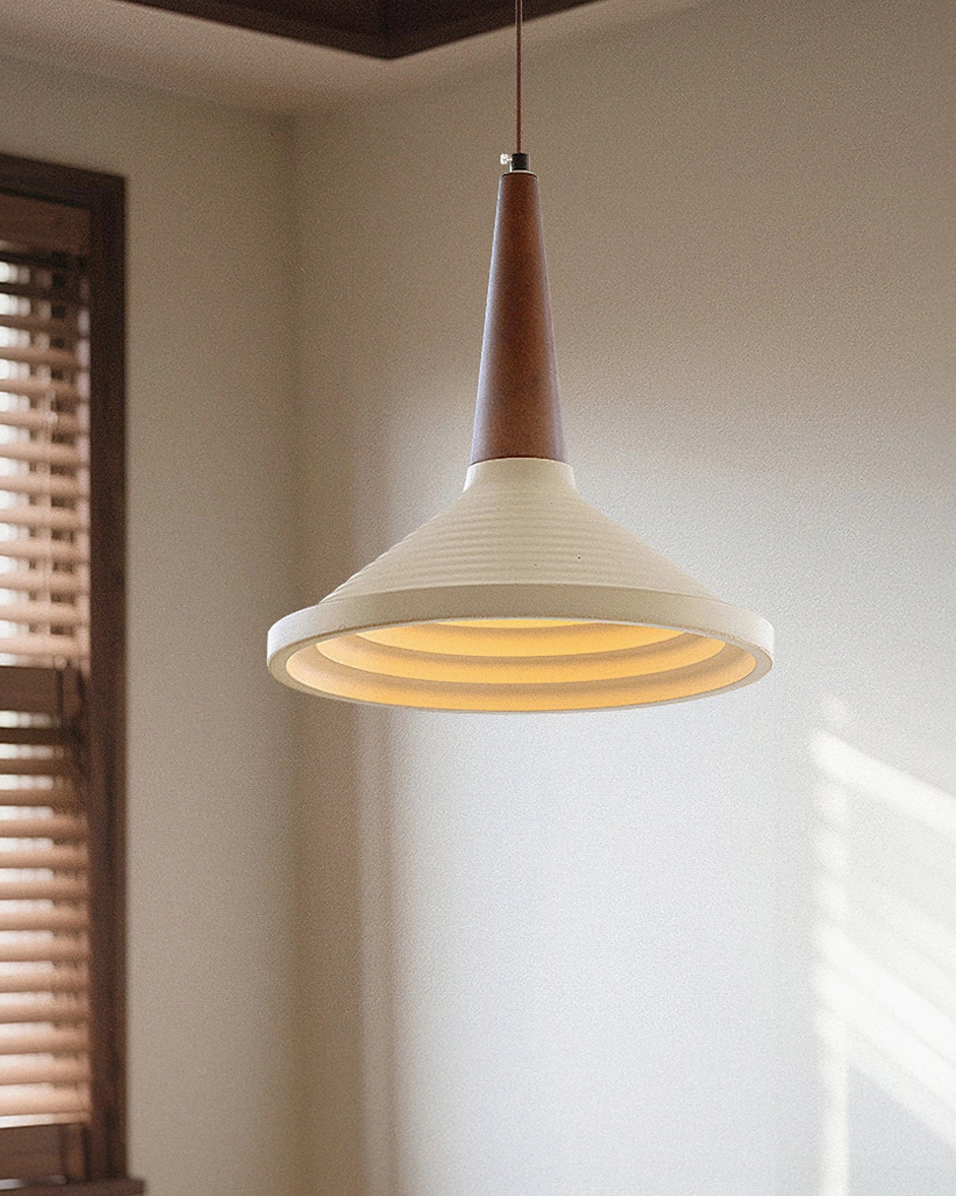 Doherty pendant lamp installation view, modern ceiling mount with wire suspension