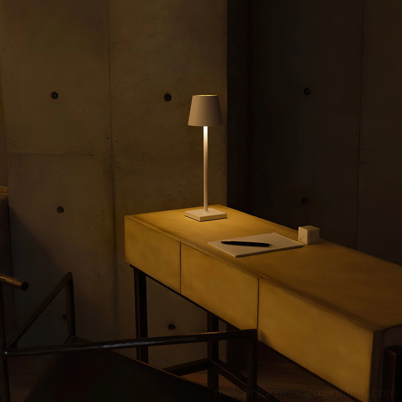 Light gray Doku cordless lamp with minimal silhouette on industrial study desk, task lighting