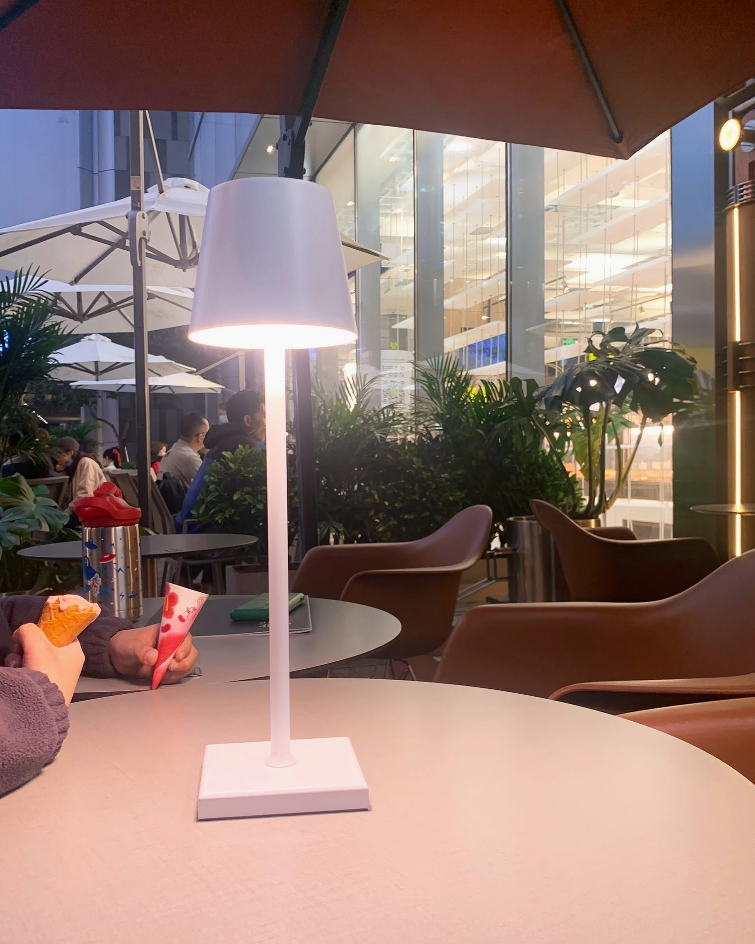 Doku portable cordless table lamp detail shot of touch-sensitive metal body and square base