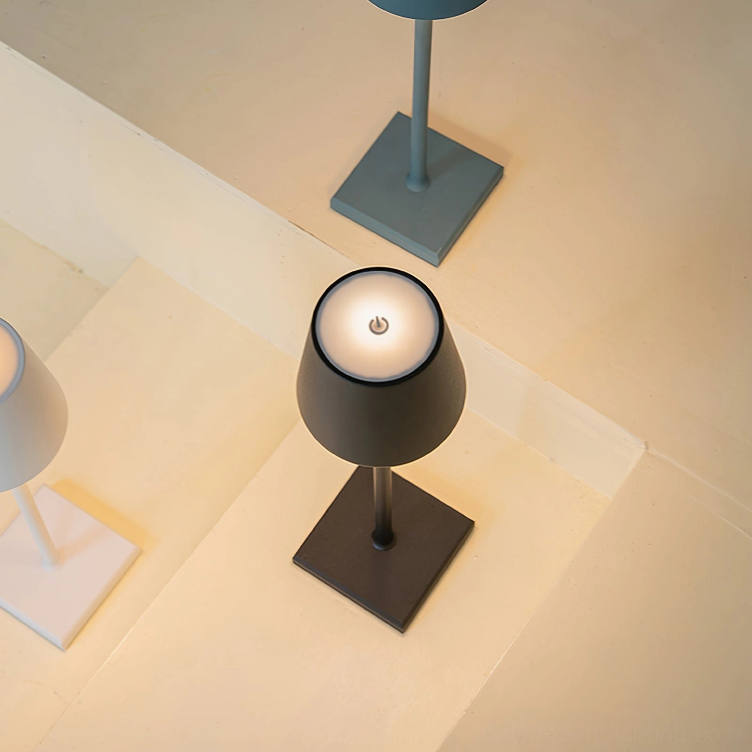Doku table lamp five finish options white black gold pink silver color selection
