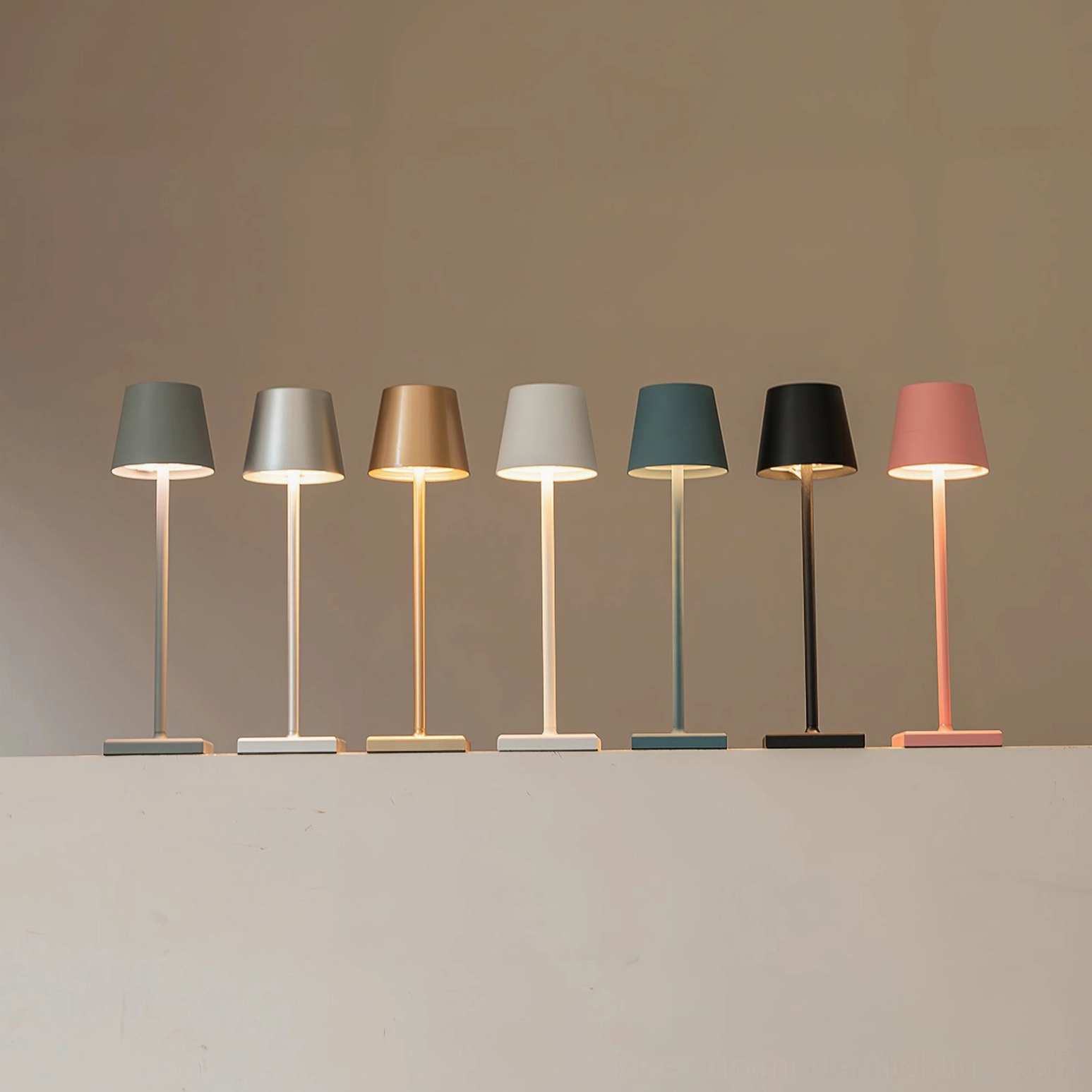 Doku portable table lamp with acrylic diffuser showing integrated LED light output
