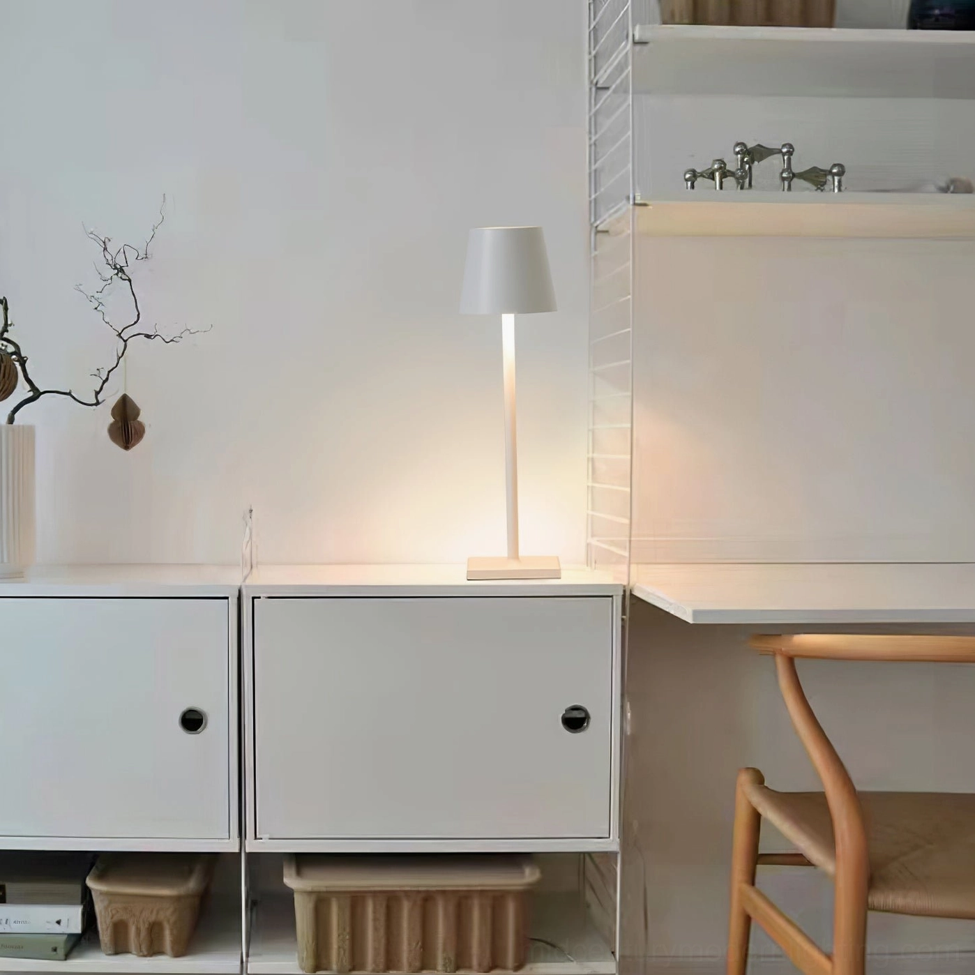Close-up of Doku cordless lamp metal cylinder showing finish quality and touch control surface