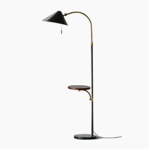 Dominique arc floor lamp with black marble base and brass accents, full front studio view showing sculptural design