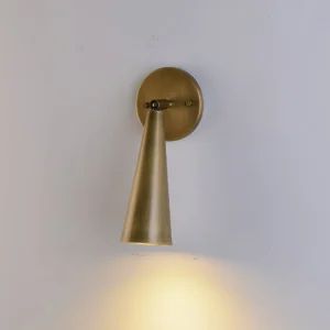 Donna wall sconce side profile showing swivel joint and round backplate detail