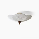 Doral petal-shaped ceiling light flush mount with beige pleated fabric shade, brass and walnut hardware - front product view
