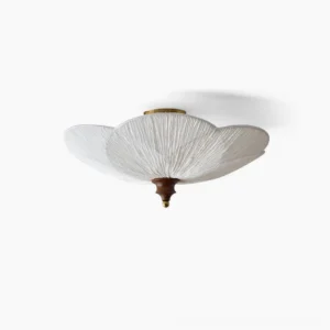 Doral petal-shaped ceiling light flush mount with beige pleated fabric shade, brass and walnut hardware - front product view