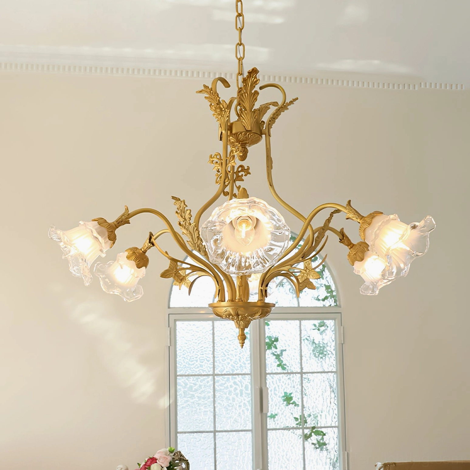 Central-focused Dore flower chandelier with large central glass bloom and four side light arms