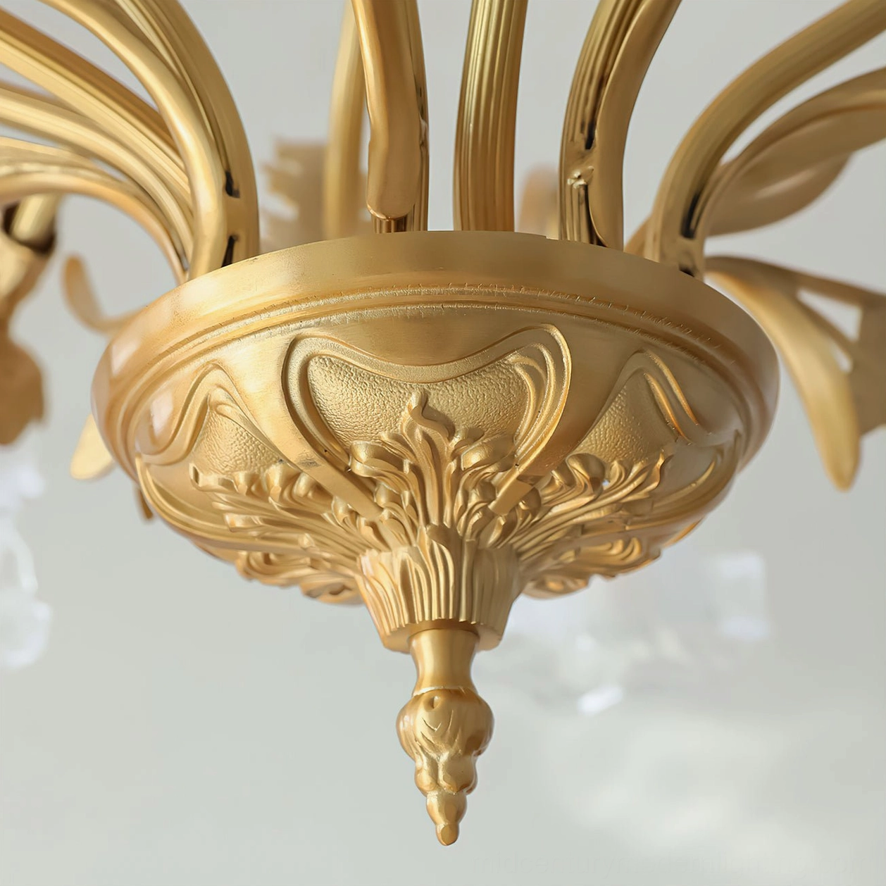 Dore flower chandelier close-up of brass frame construction and hand-blown glass petal details