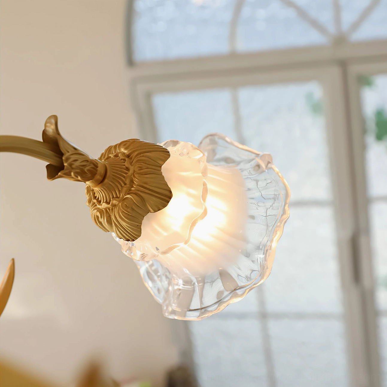 Dore flower chandelier hanging chain and brass ceiling canopy installation view