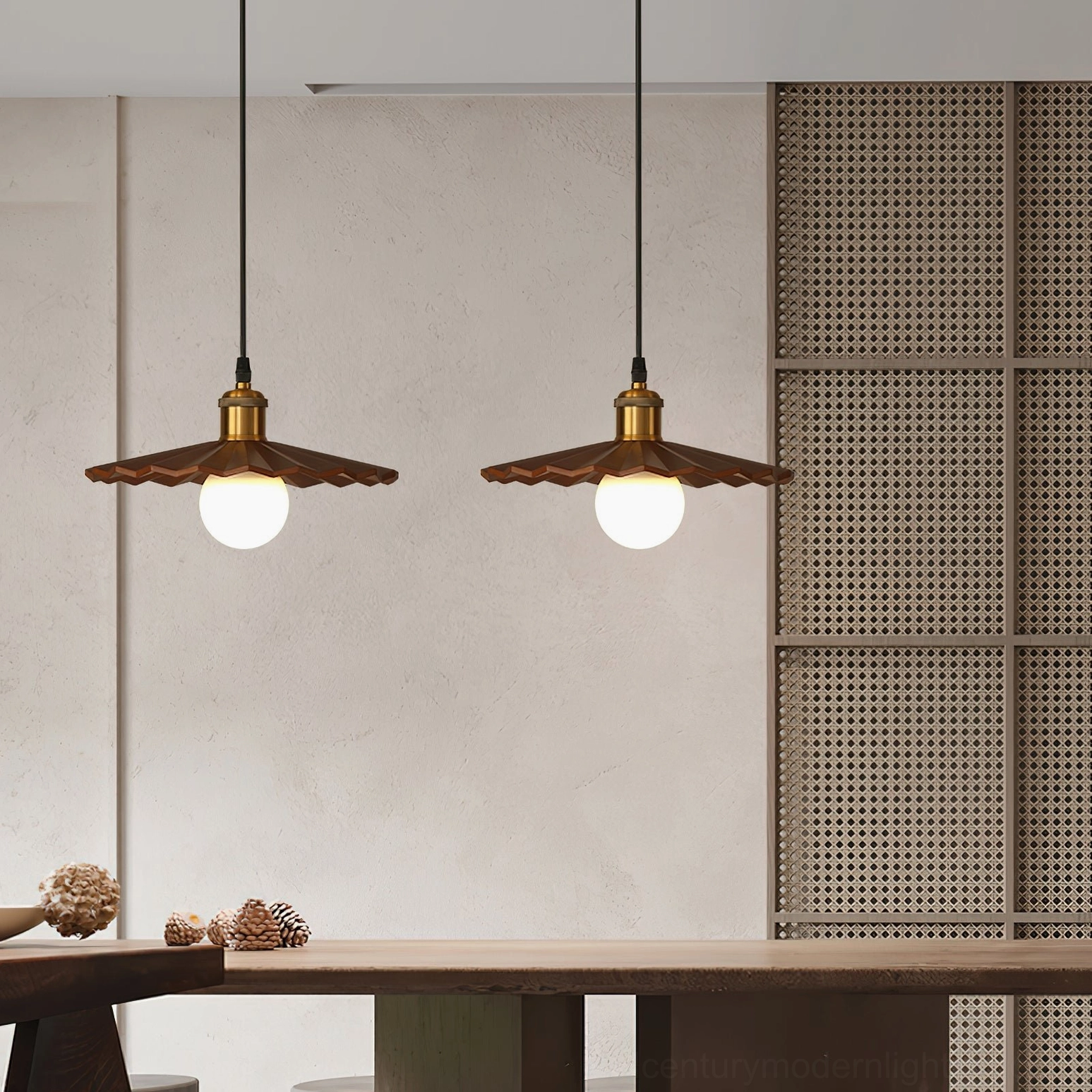 Pair of natural wood geometric pendant lights over dining table with perforated wall panel and wooden chairs - contemporary dining space