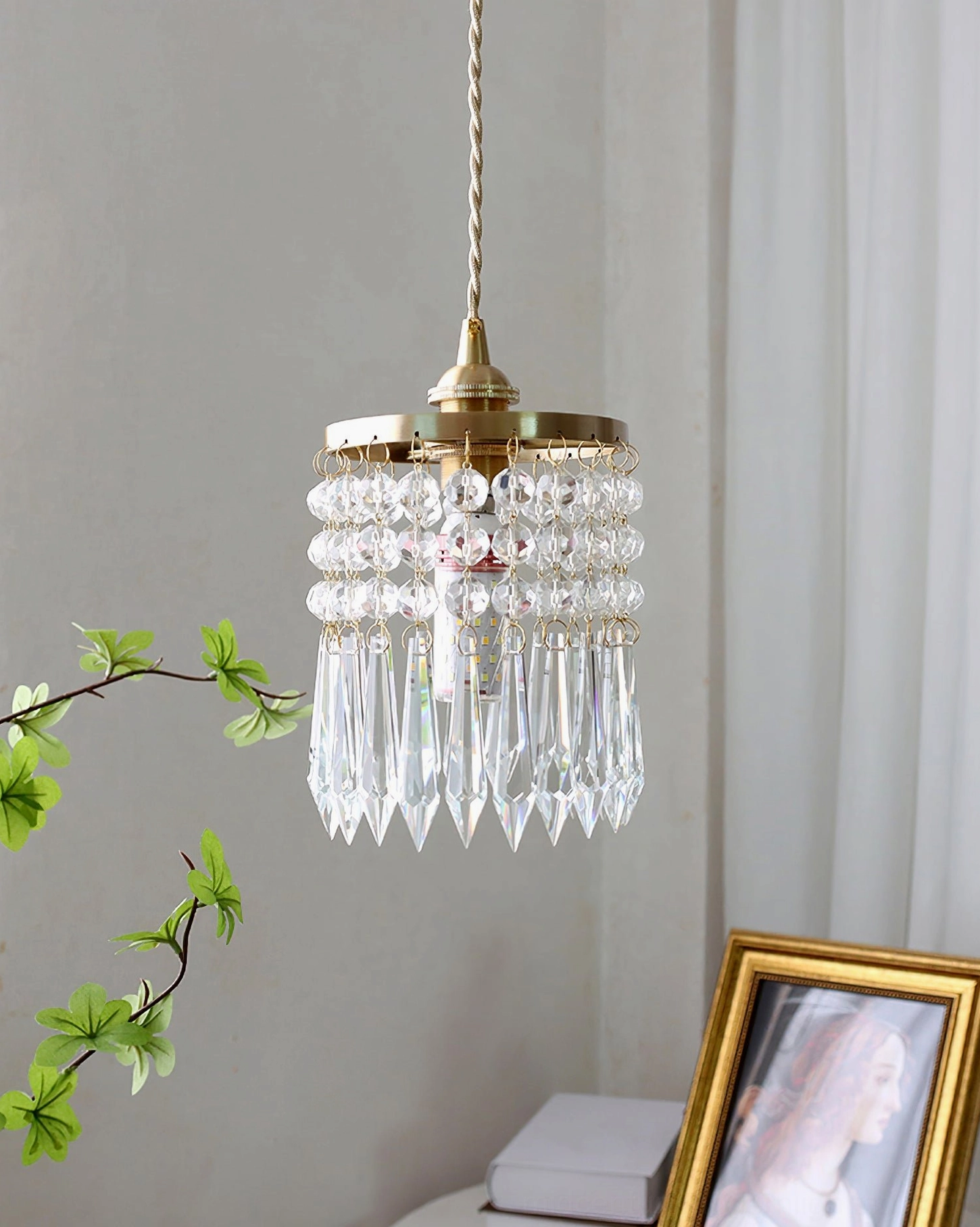 Double-layer crystal pendant light with long hanging strands, luxury styling