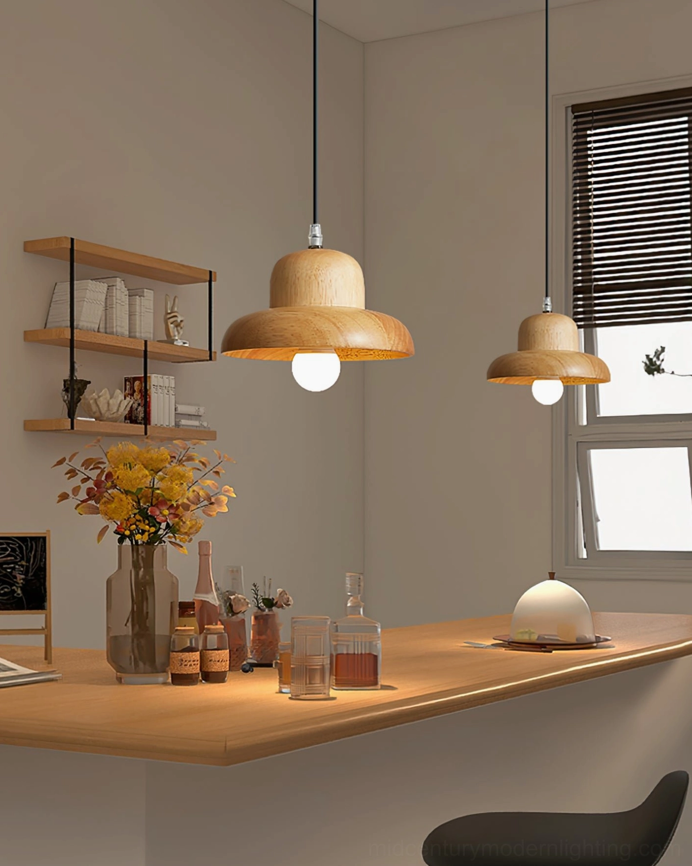Two matching natural wood pendant lamps suspended over home bar counter with coordinated warm wood finish