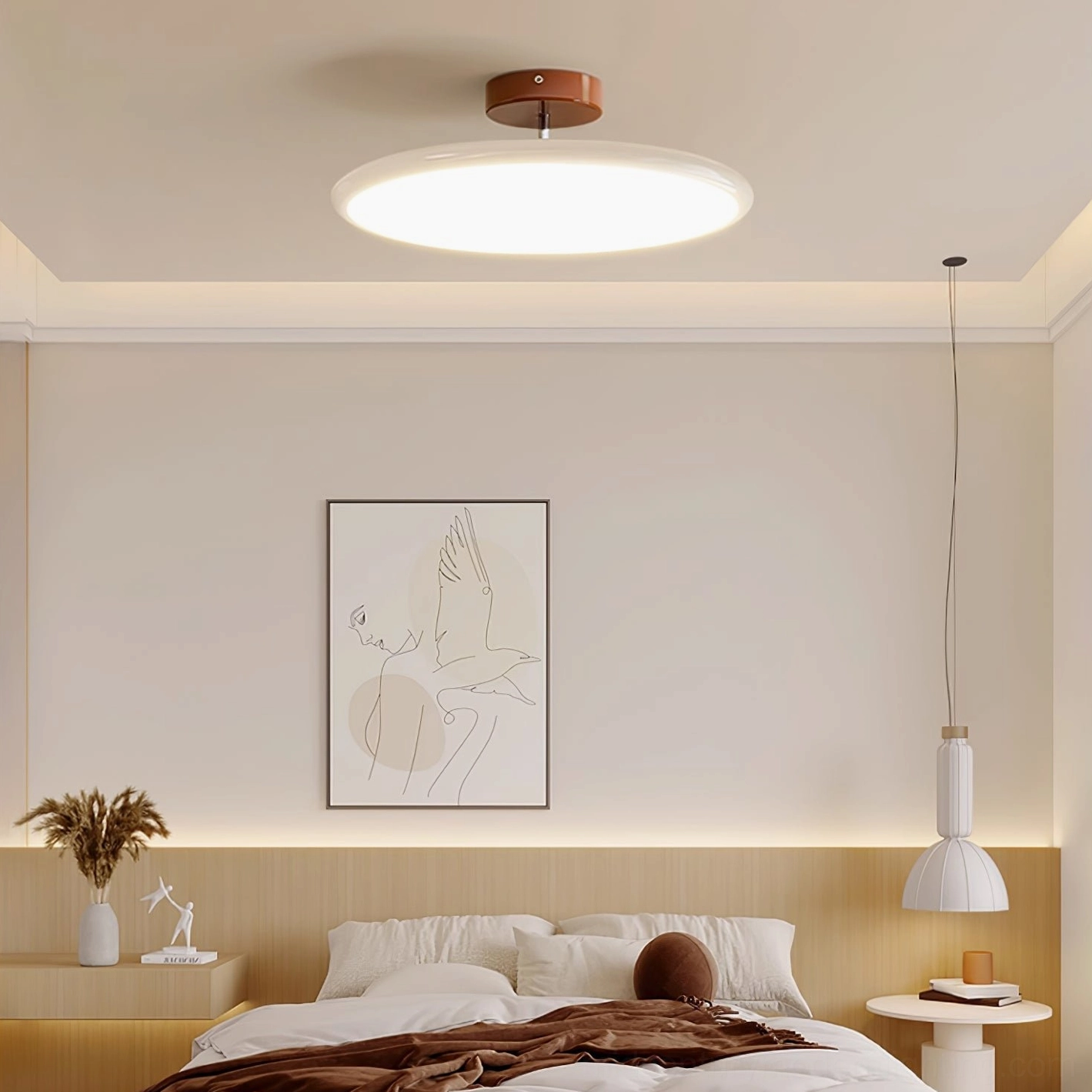 Drift disc lamp in warm finish showcasing minimal profile and halo effect
