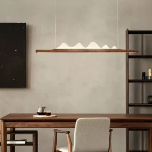 Drift Linear Pendant Light installed above dining table in contemporary home with warm lighting ambiance