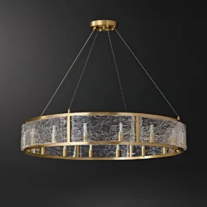 Illuminated drum chandelier with matte brass frame and candle bulbs studio photography