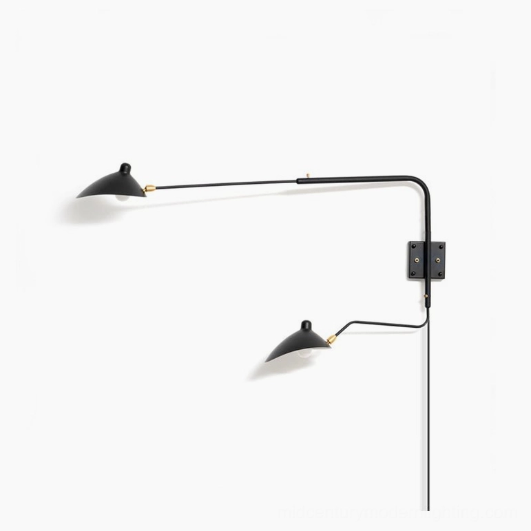 Dual-arm black spider wall sconce showing full range of articulation and positioning
