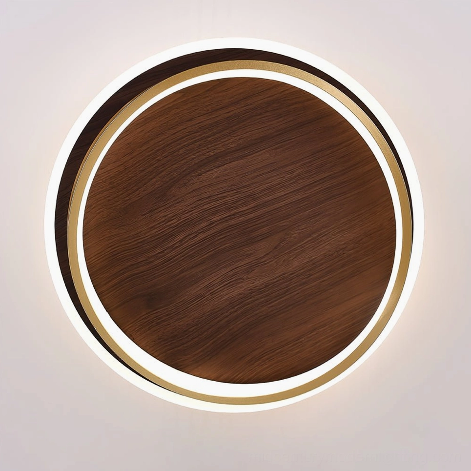 Dual-ring ceiling light with warm metallics and natural wood tones in modern bedroom, Scandinavian minimalist design