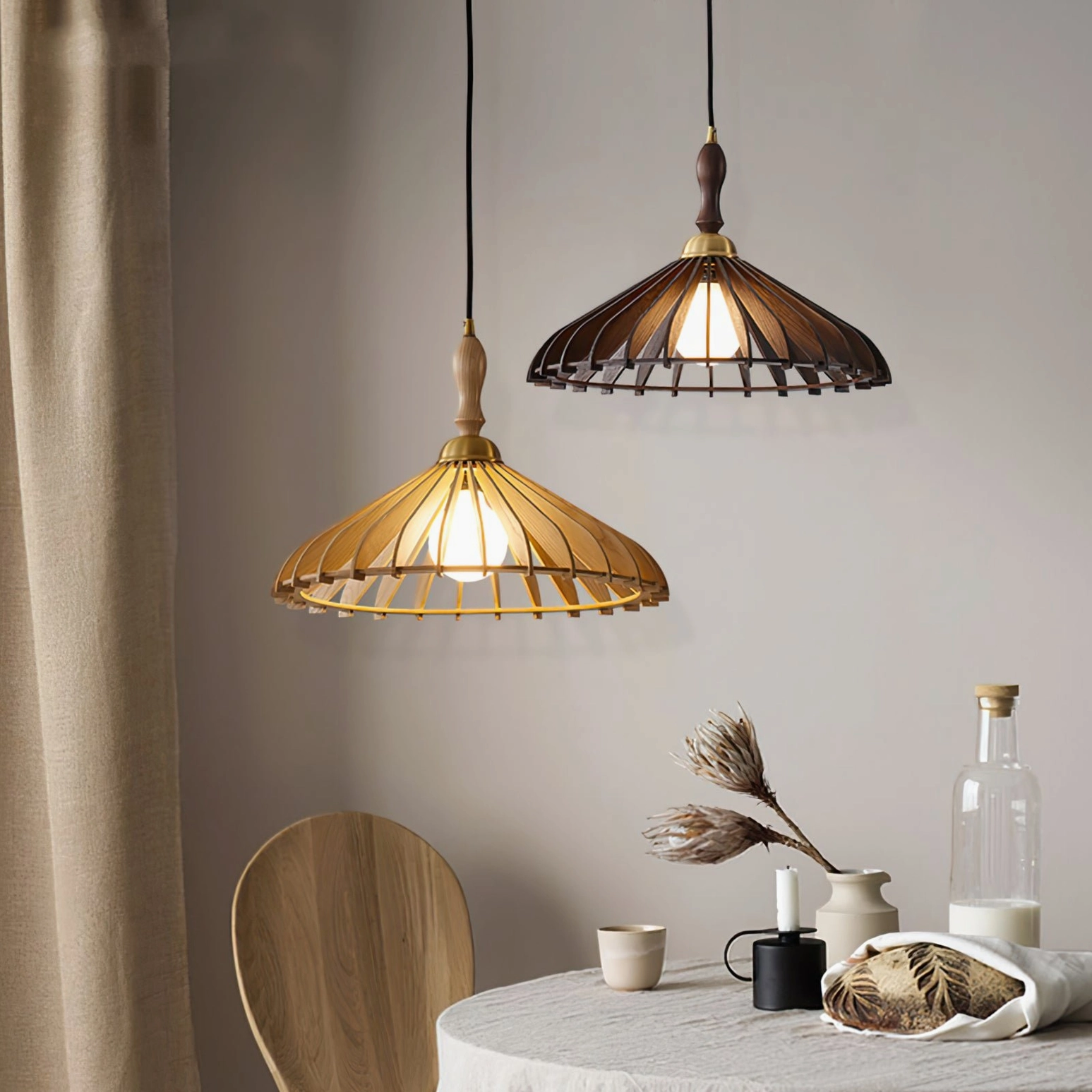 Two-tone wooden umbrella pendant lights hanging over dining table, mixed natural wood and walnut finishes