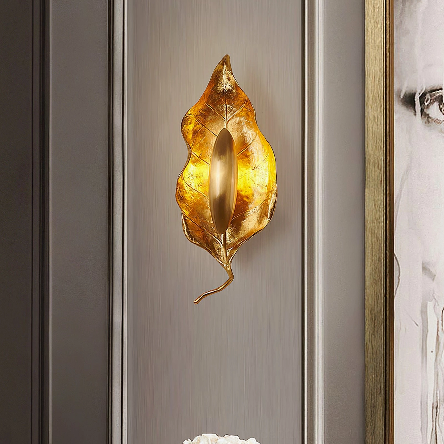 Dumaine wall lamp contemporary interior styling with minimalist decor and warm brass accents