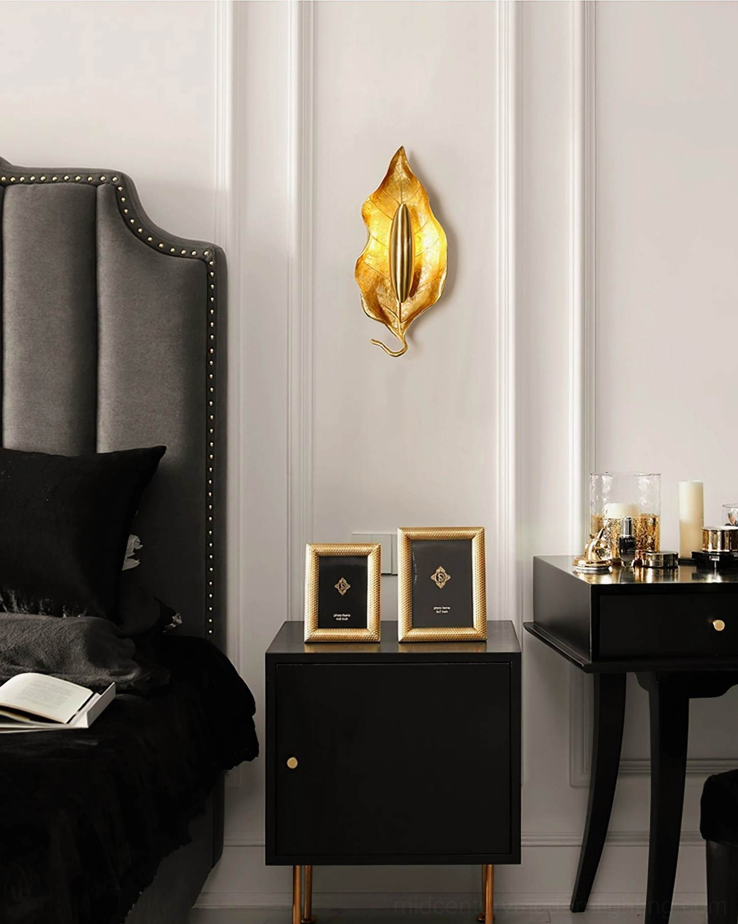 Dumaine modern wall sconce illuminated in contemporary living space with ambient light diffusion