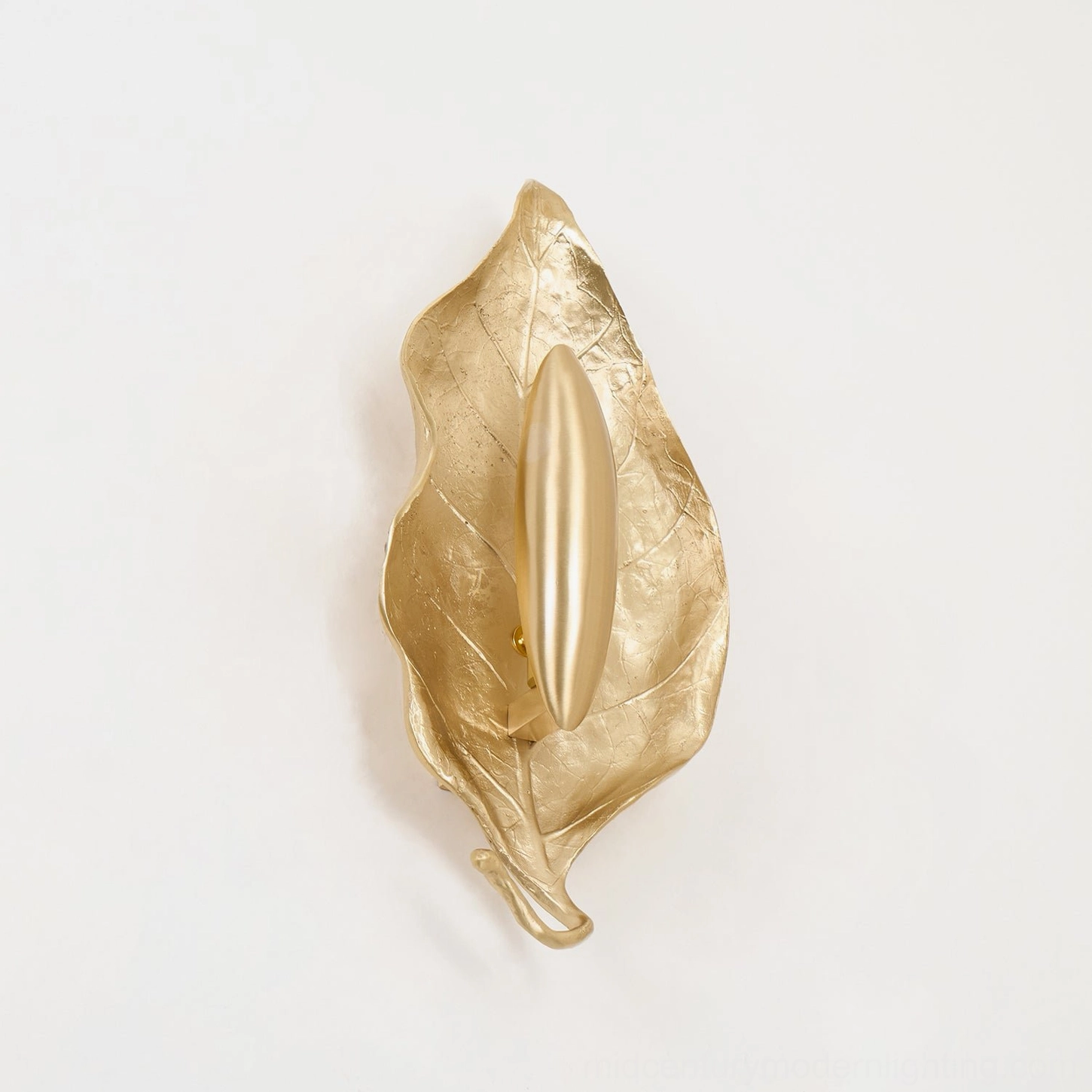 Dumaine leaf wall lamp artistic angle emphasizing sculptural quality and botanical inspiration of design