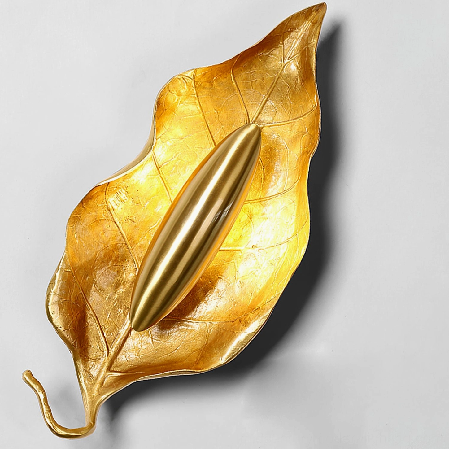 Dumaine leaf wall lamp LED efficiency modern lighting shown with clean white studio background