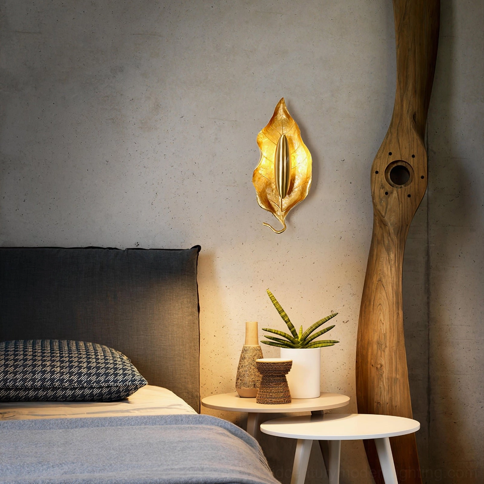 Dumaine wall sconce lifestyle image showing how brass leaf form complements modern home decor