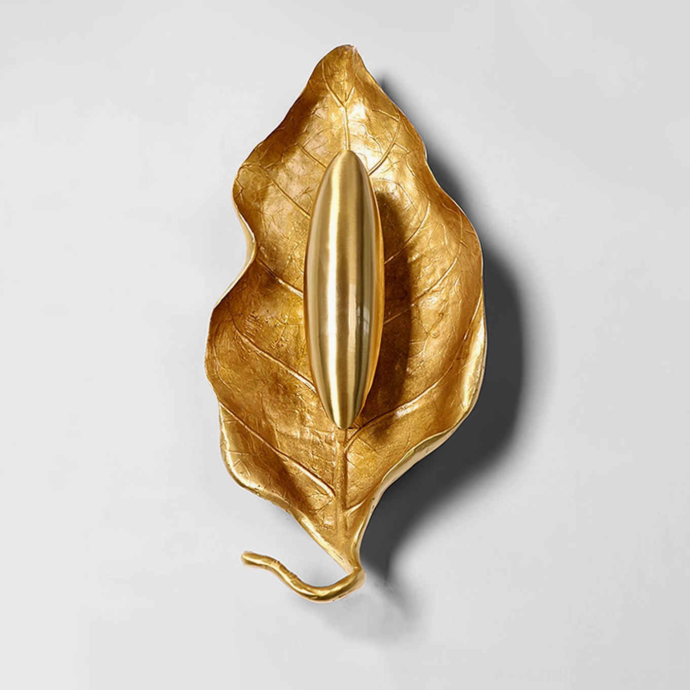 Dumaine brass leaf wall sconce paired installation showing symmetrical wall mounting design