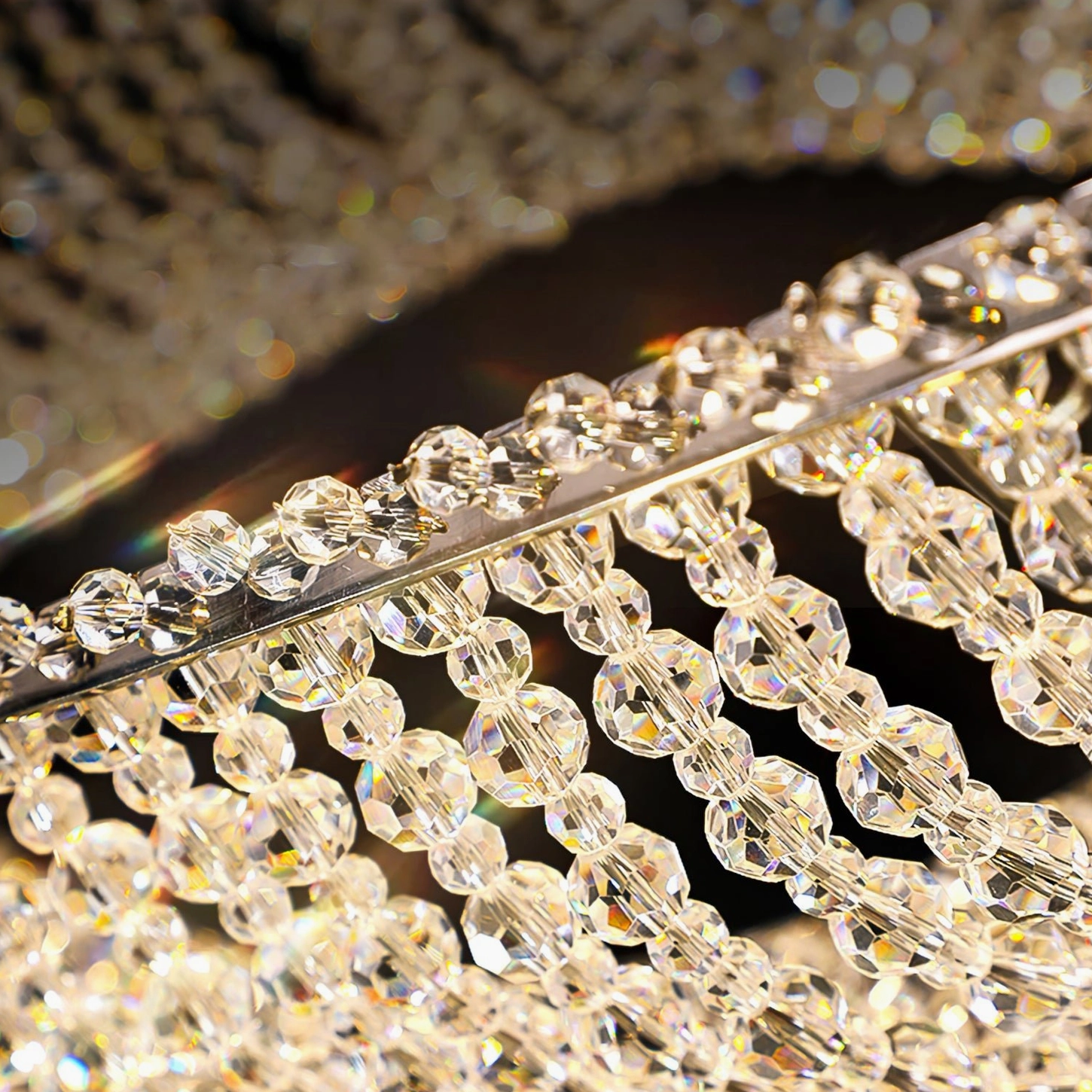 Dumini wave chandelier faceted crystal bead string detail with reflective texture