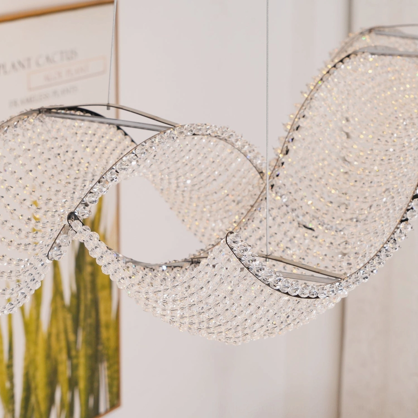 Dumini chandelier gold finish variant with warm luxury aesthetic