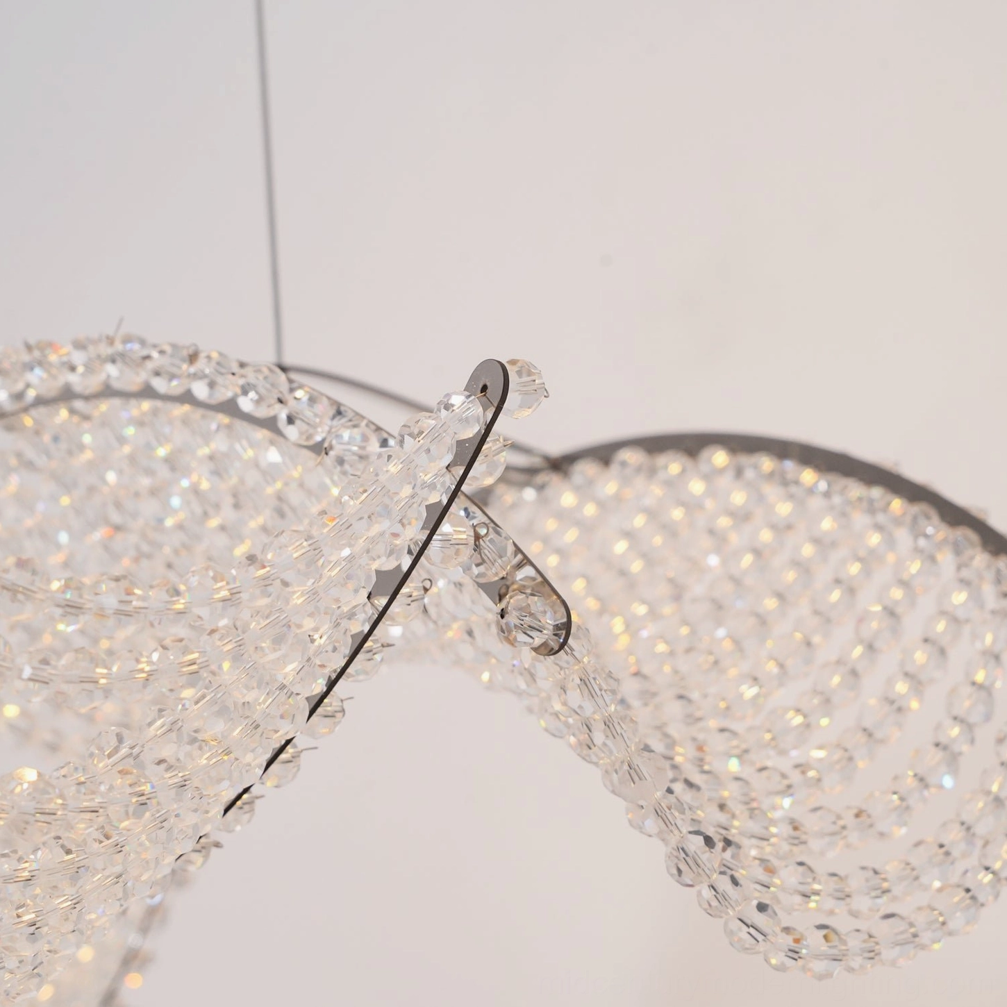 Dumini crystal chandelier in modern home interior with elegant ambient lighting